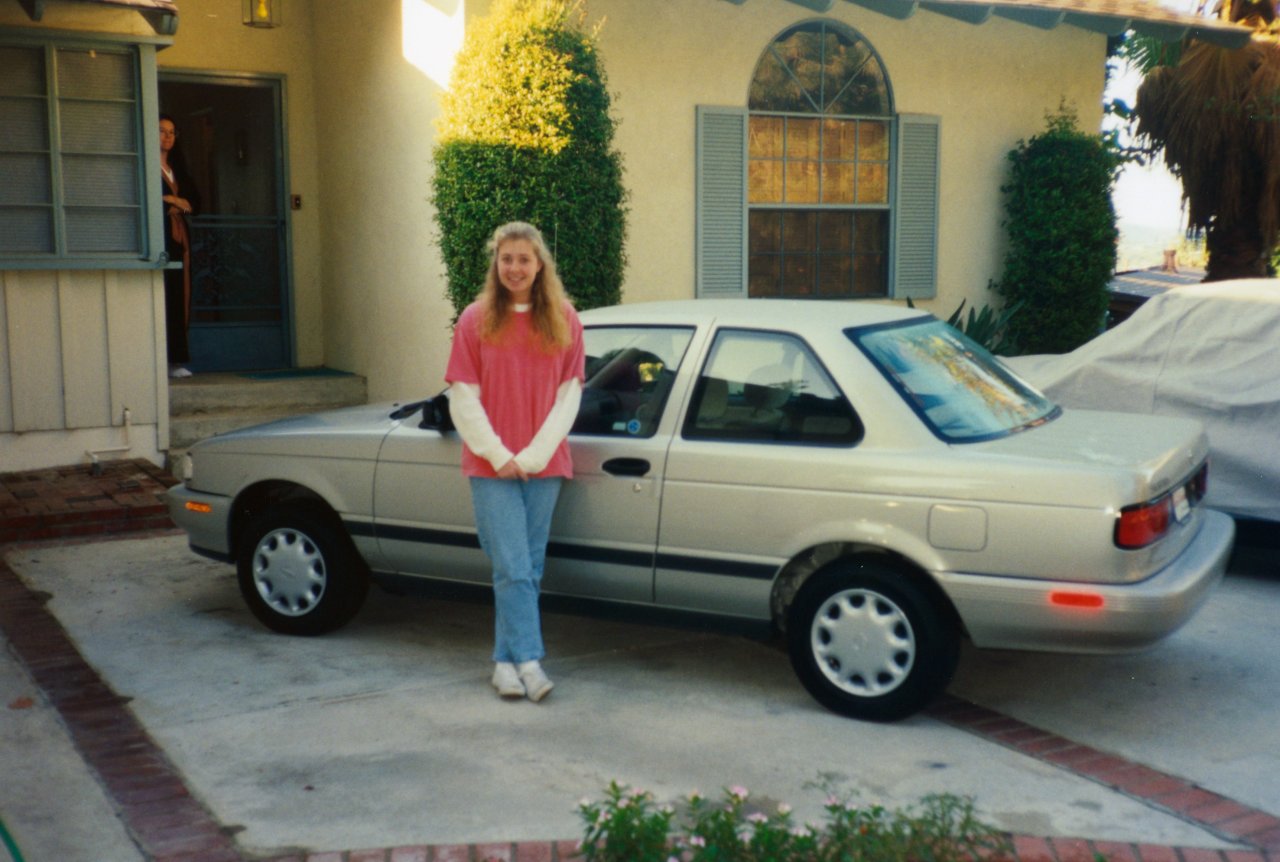 Jen with her Sentra on her way to College